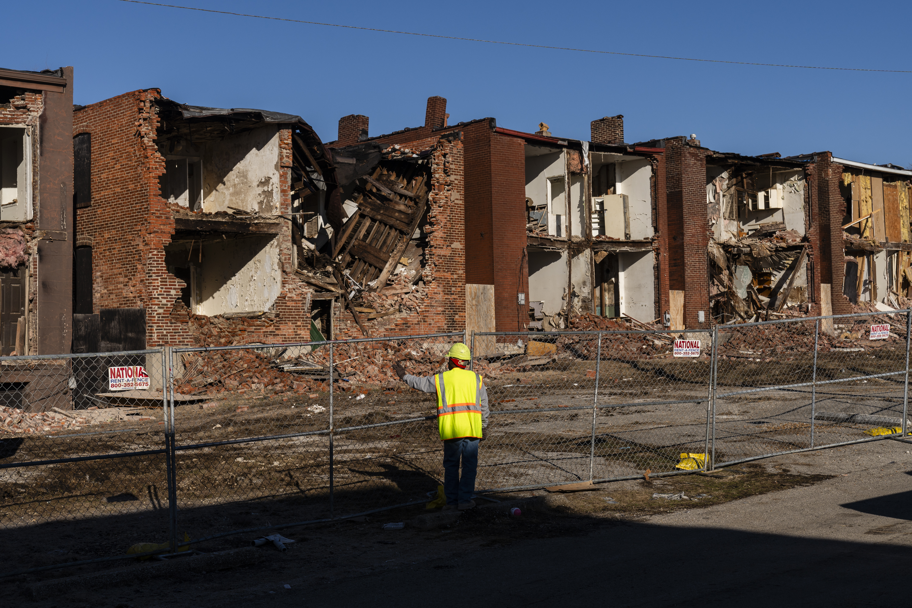 A row of buildings being demolished.